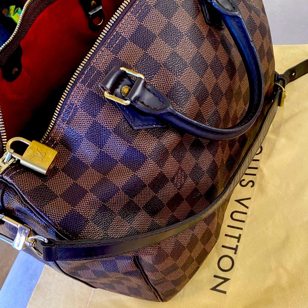 Authentic Louis Vuitton Speedy 35 with storage bag.  Comes with straps.
